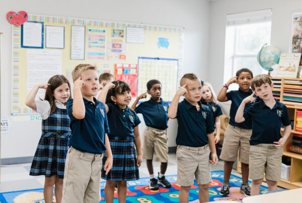 Kindergarten students engaging in classical learning at PCS, a private Christian school in Houston, TX.