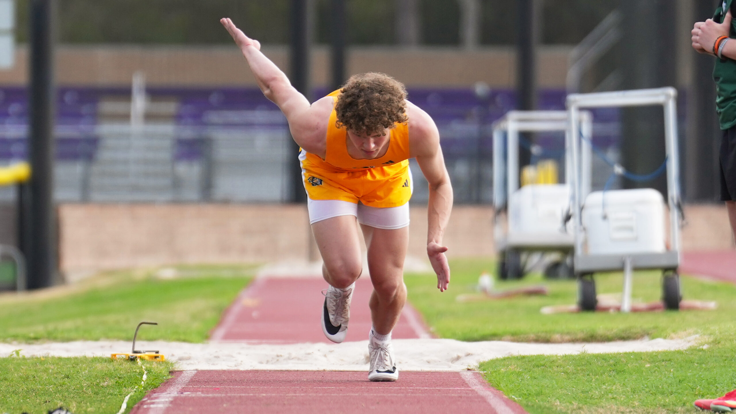 Providence Classical School Track & Field long jump athlete running