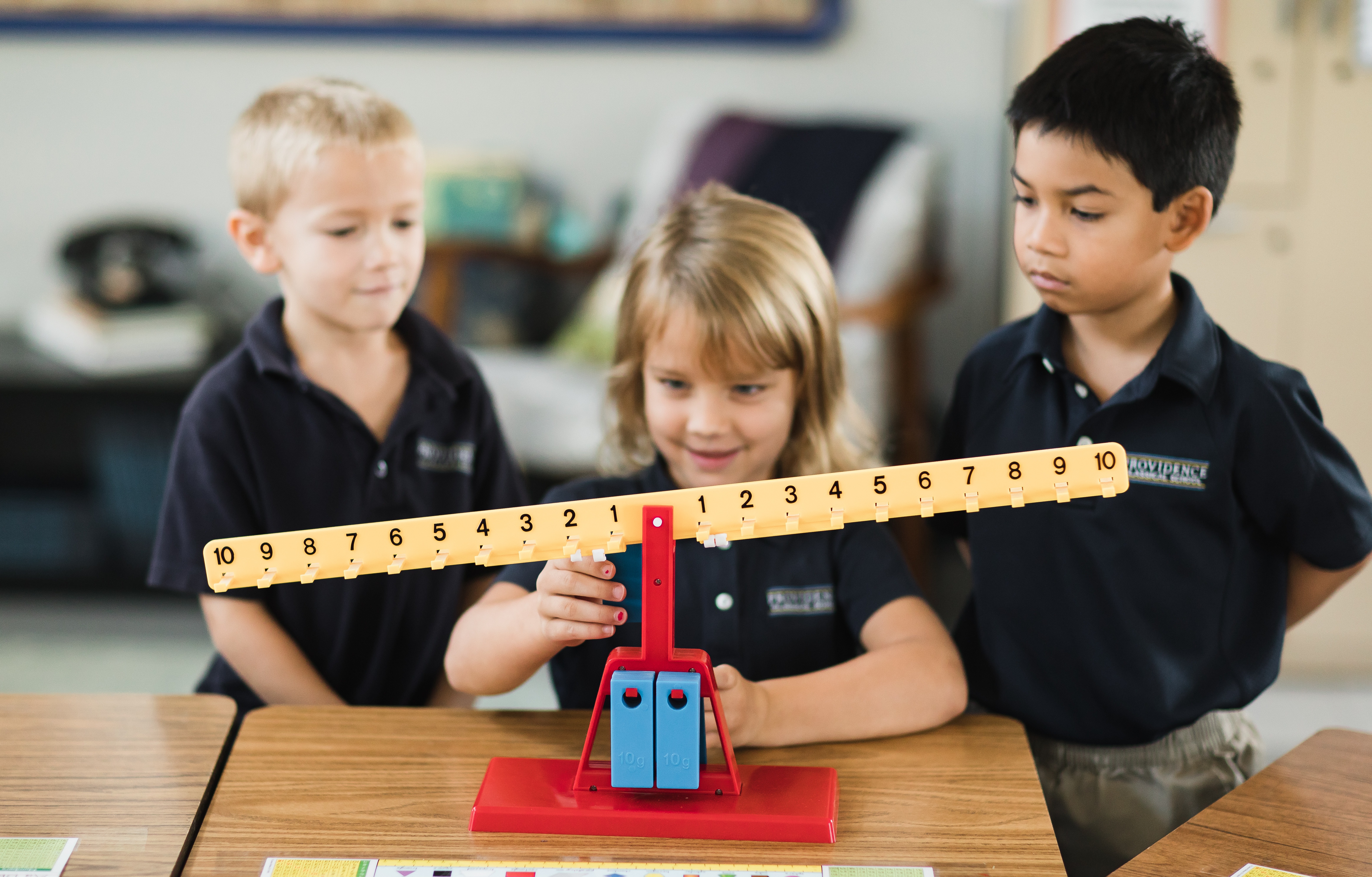 Providence Classical School students using math manipulatives to learn new concepts