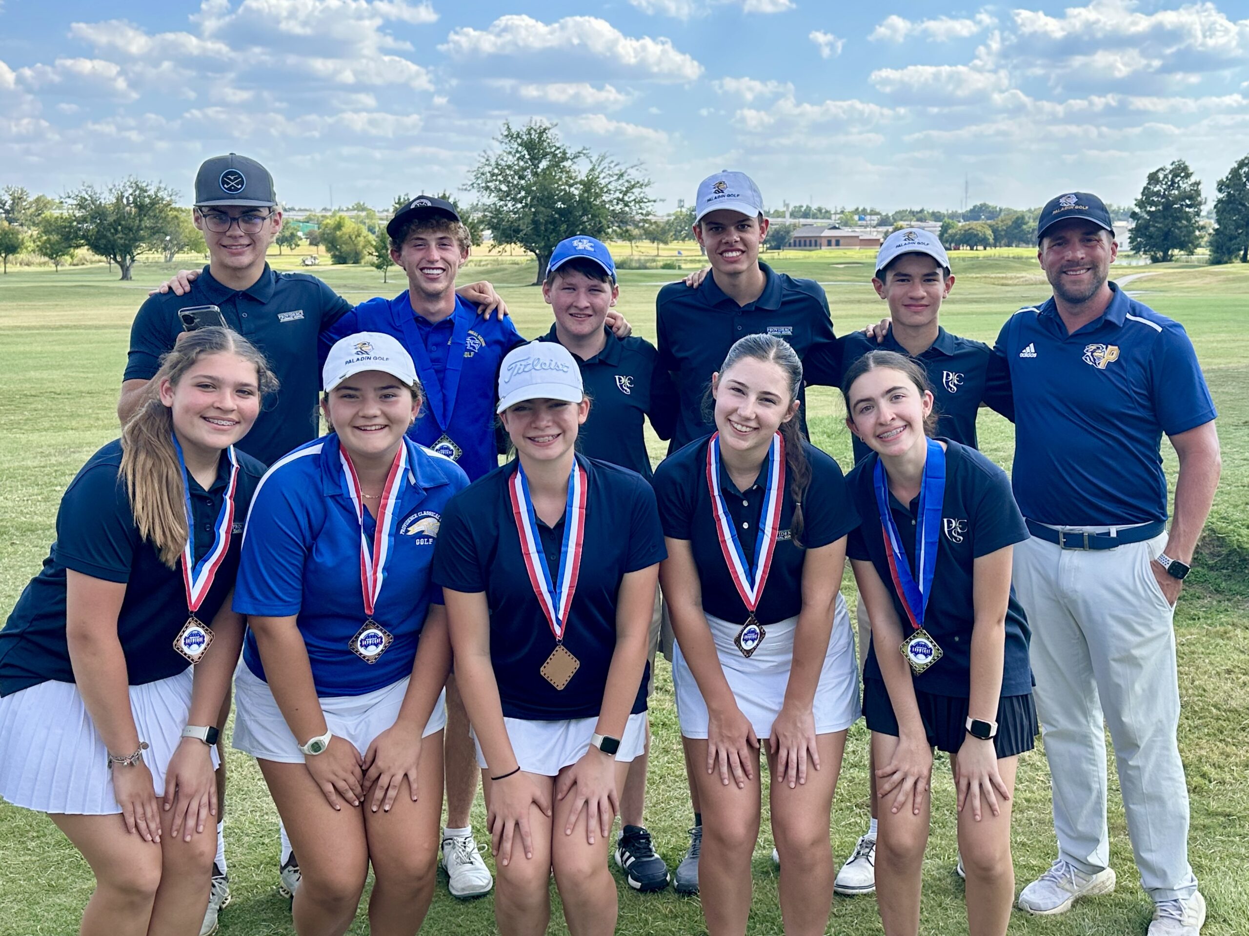 Providence Classical School Middle School Golf team with awards