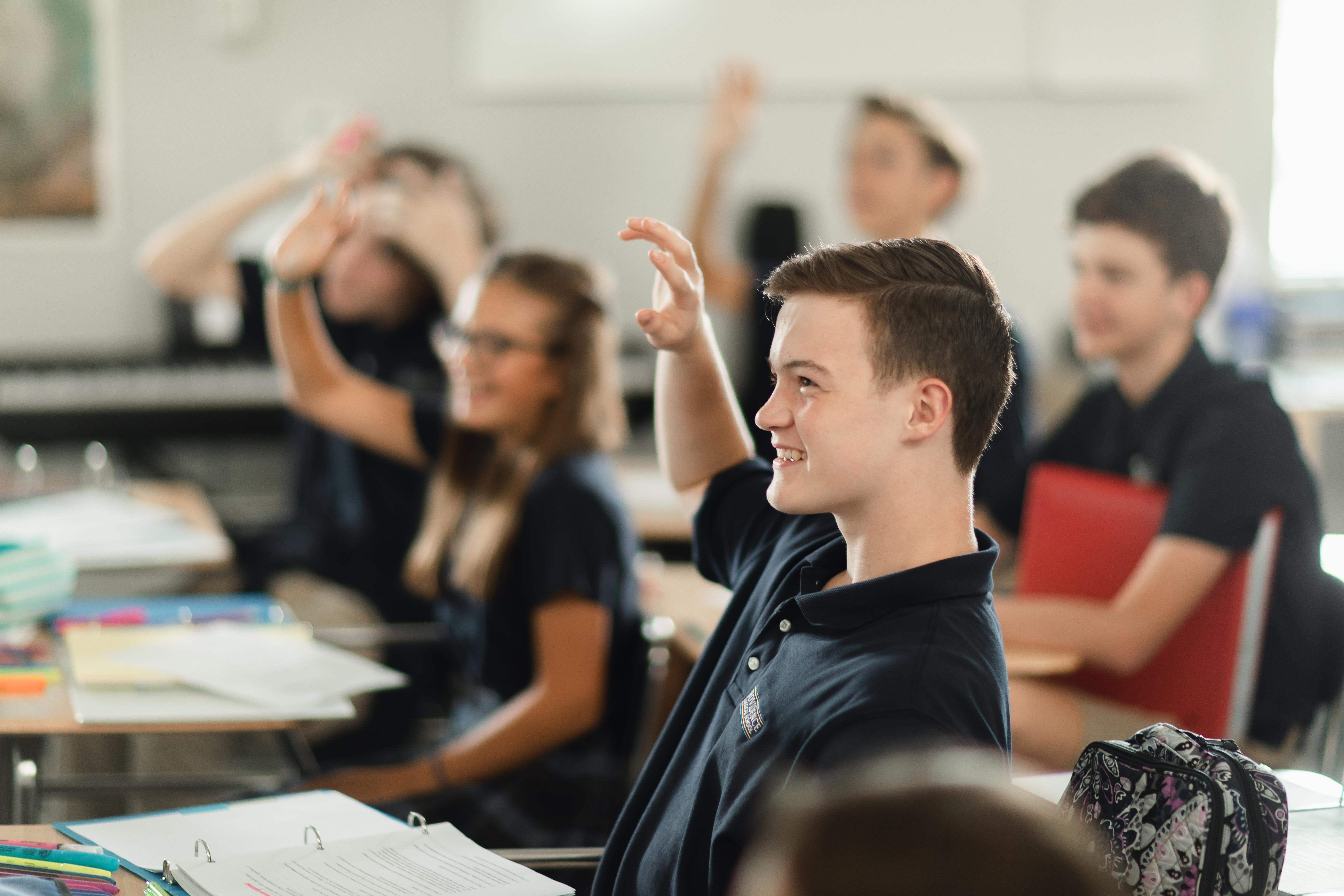 Students at Providence Classical School asking questions