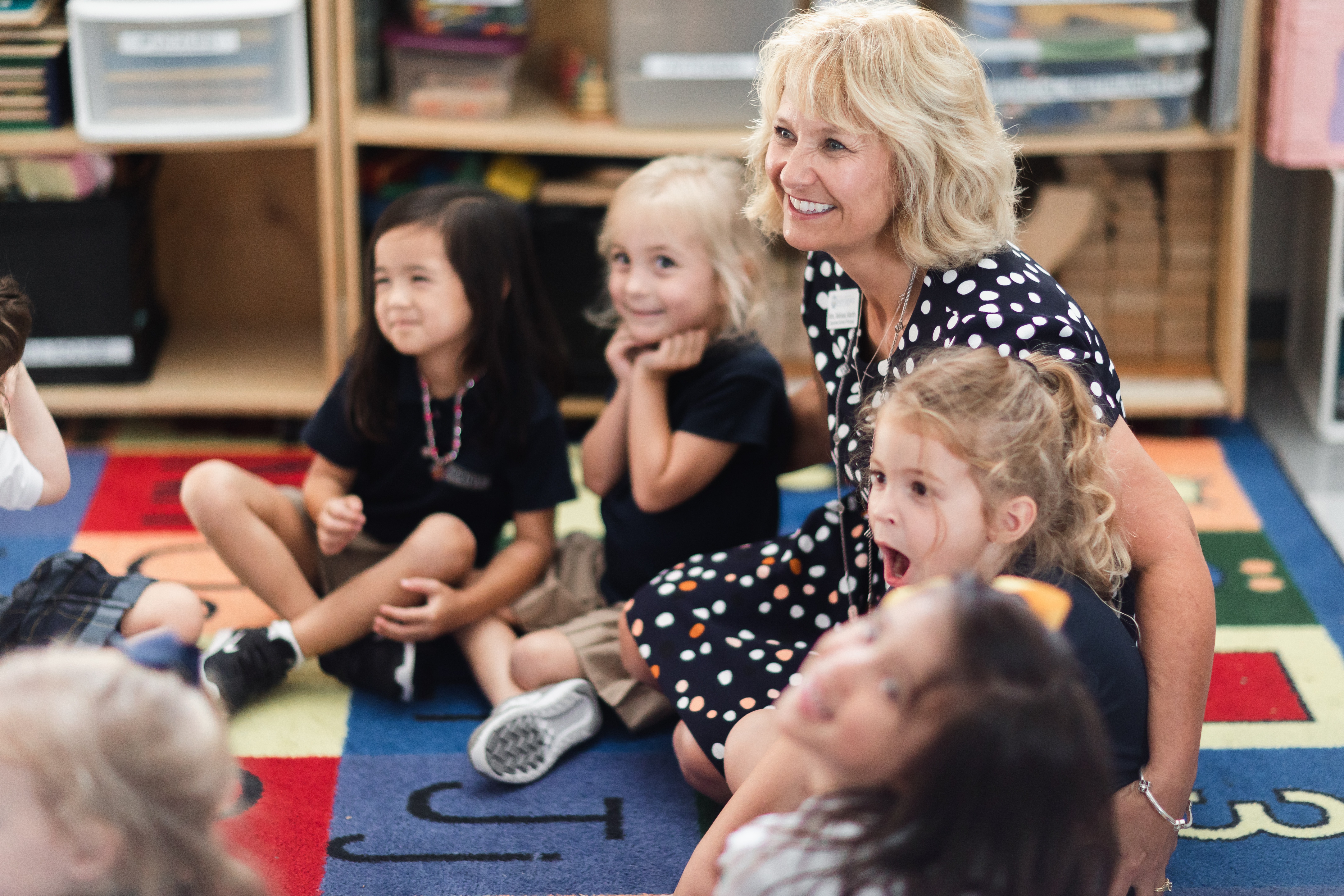 Preschool students with loving staff at Providence Classical School