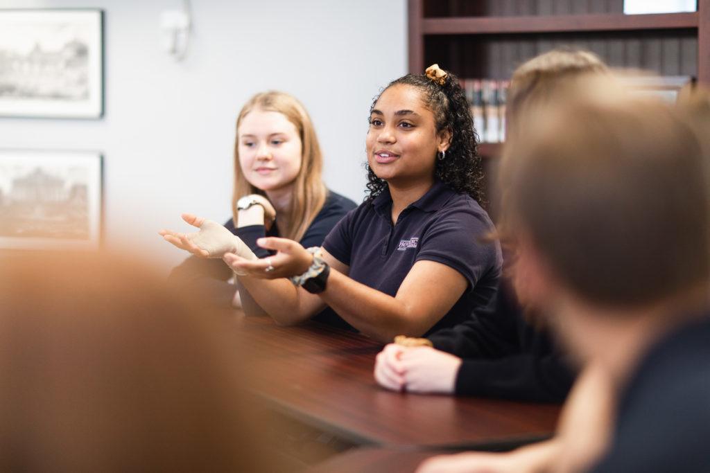 Providence Classical School seniors debating in Rhetoric class