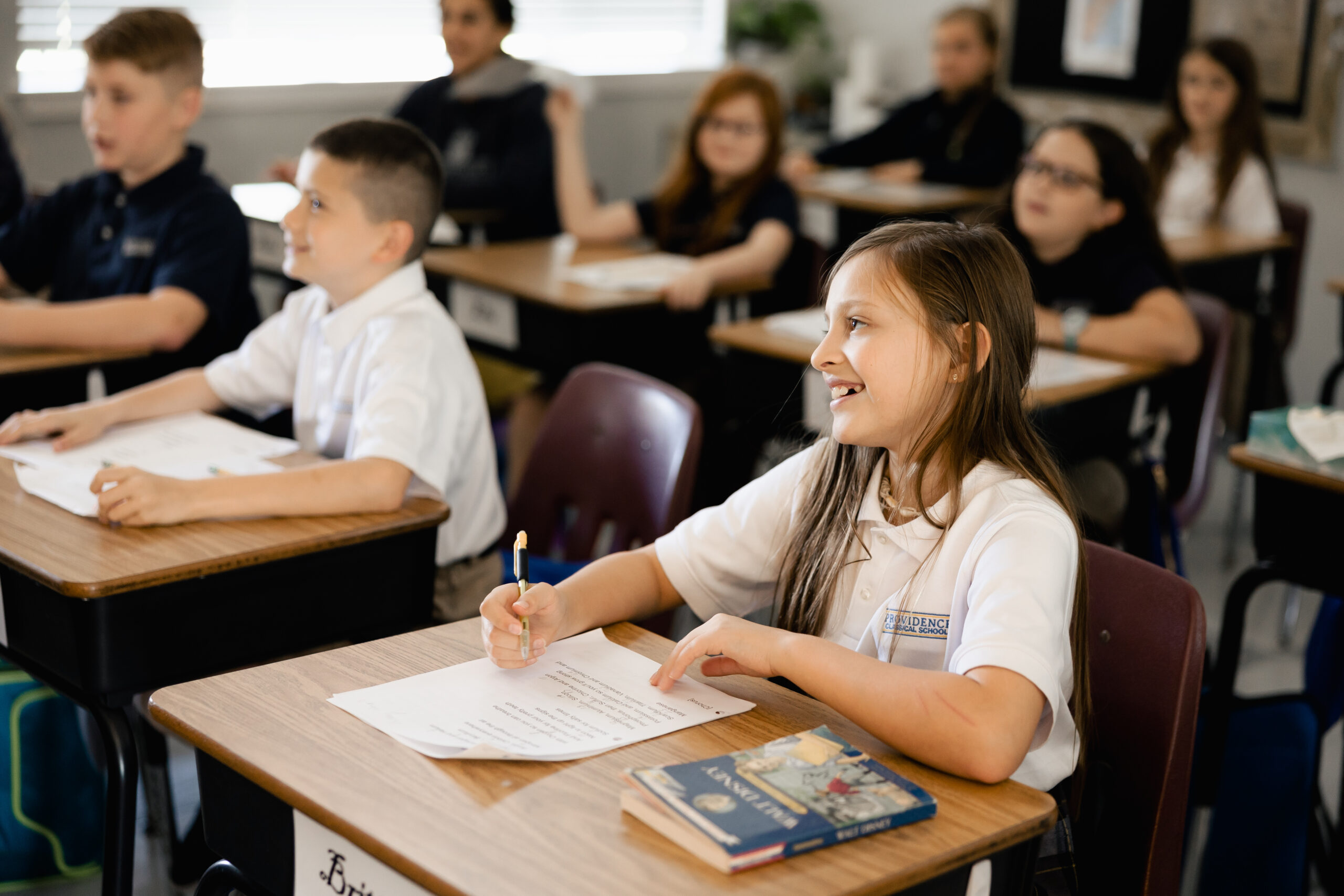 Elementary students listening and attending well in class at Providence Classical School