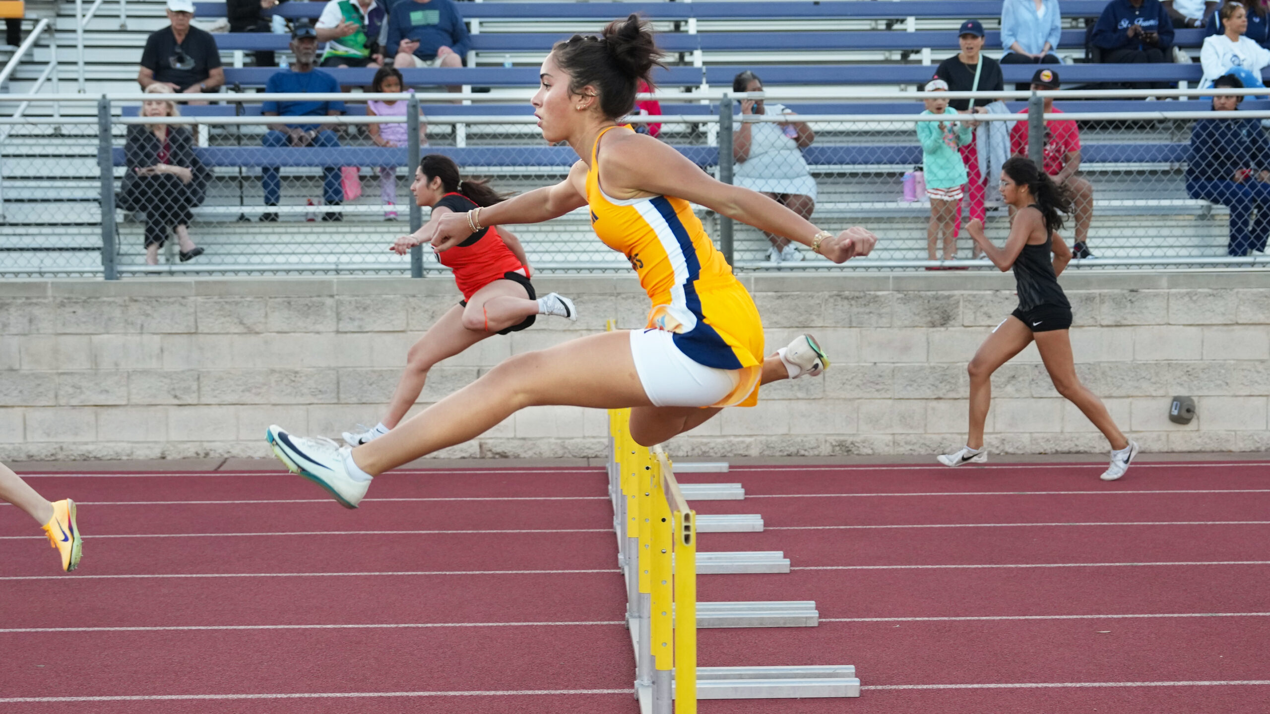Providence Classical School Varsity Girls hurdler
